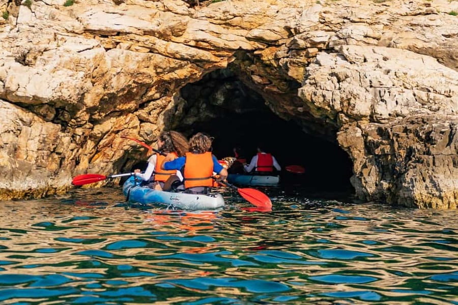 Pula: Three Island Kayak Tour with Cave Photo & Snorkeling - First paddle and the route toward Grotta di quarzo