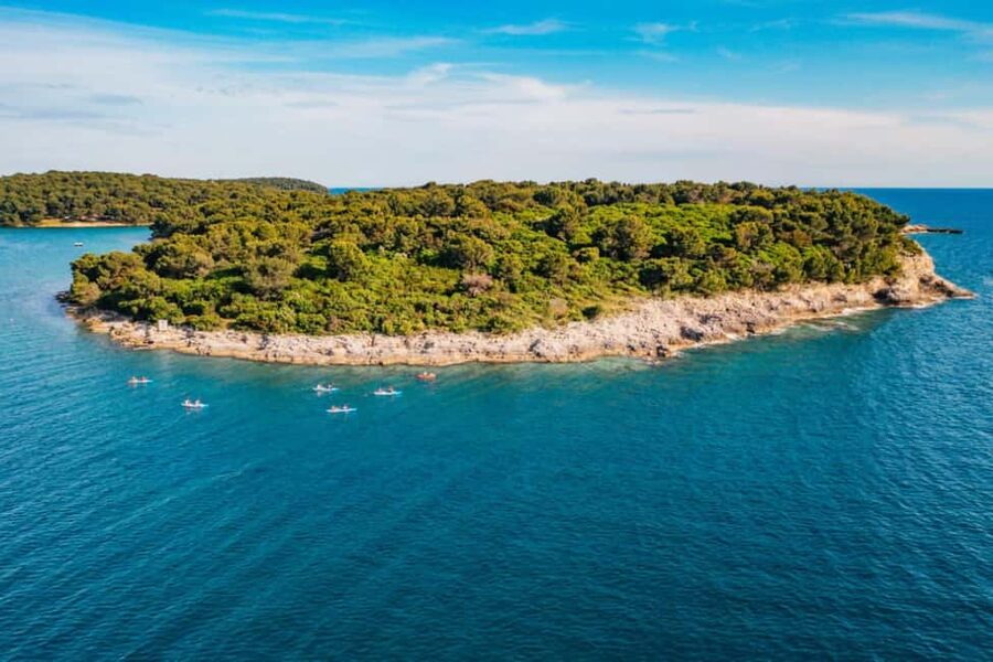 Pula: Three Island Kayak Tour with Cave Photo & Snorkeling - Fratarski Island brings the first real break