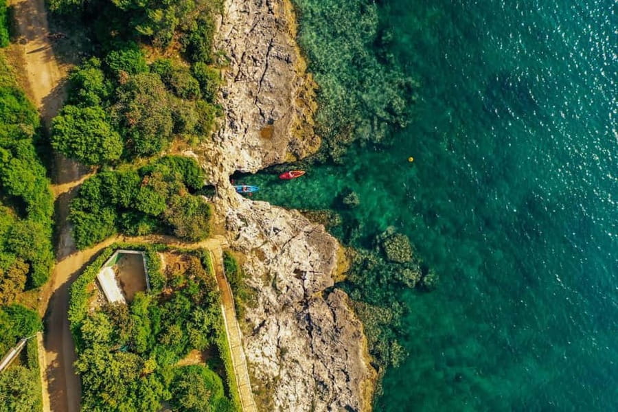 Pula: Three Island Kayak Tour with Cave Photo & Snorkeling - Weather can change the day