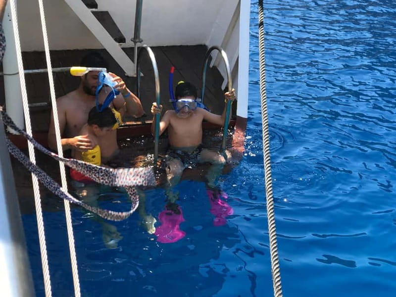 Rhodes: Boat trip to Symi island with swimming at St. George - Returning to Rhodes after a full day at sea