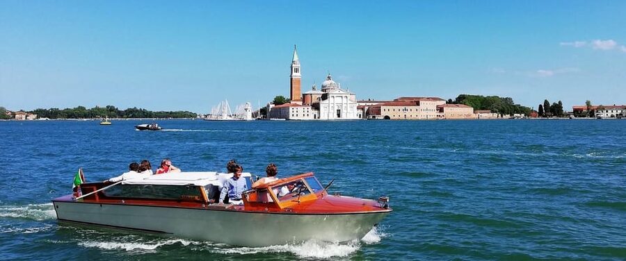 Rome: Venice Day Trip with Islands Cruise and City Walk - Burano’s colorful canals and lacework