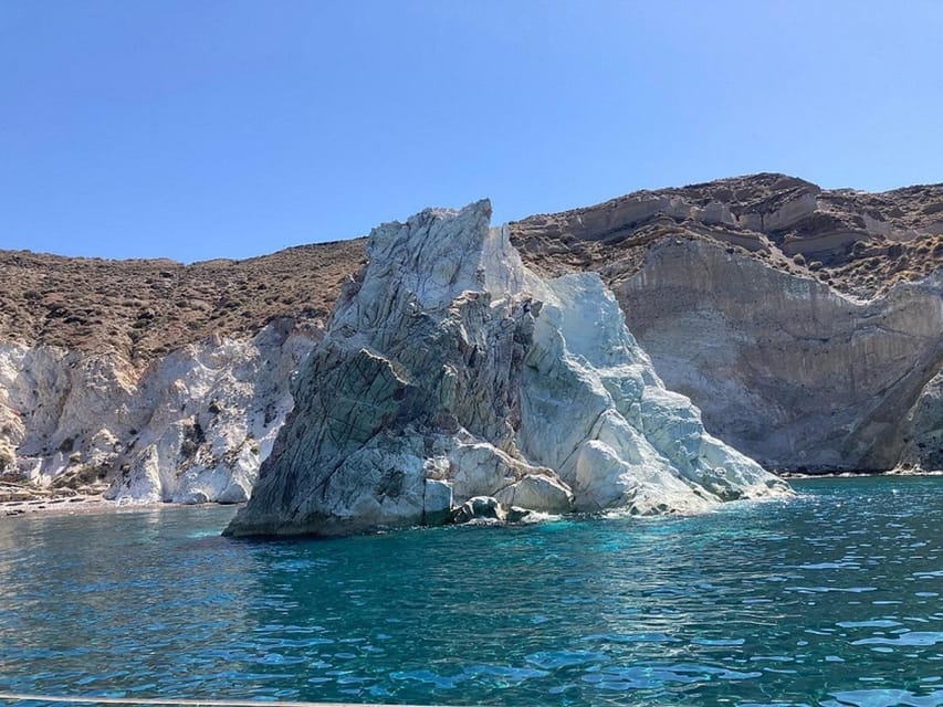 Santorini:Cruises with Catamaran around the Volcanic Island. - The volcanic thermal springs near Kameni