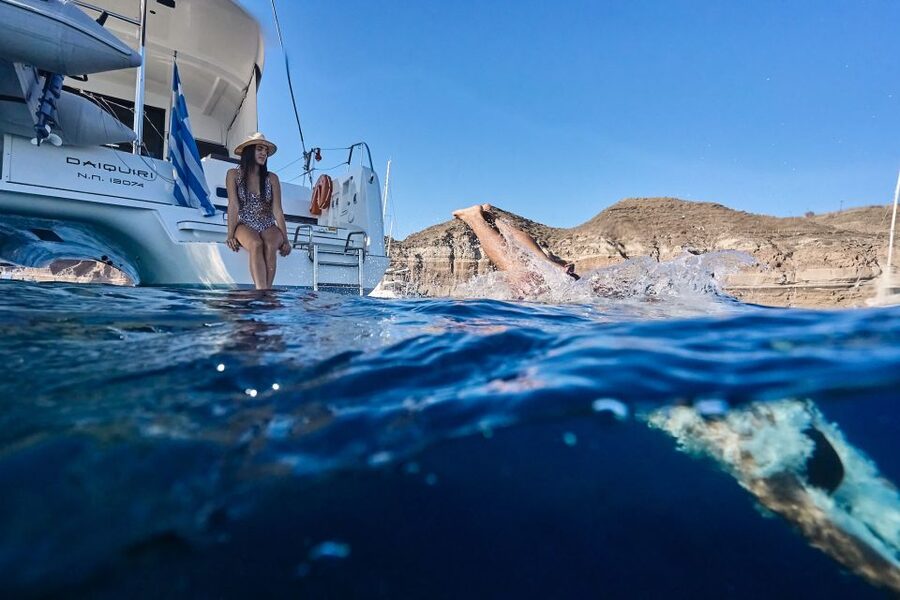 Santorini: Southern Island Luxury Catamaran Cruise with Meal - Nea Kameni and the volcanic water stop