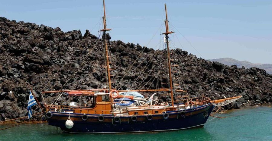 Santorini: Thirassia Islands and Volcano Guided Cruise - Walking across Nea Kameni’s black lava