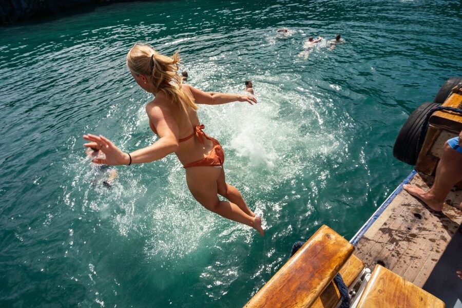 Santorini: Volcanic Islands Cruise with Hot Springs Visit - Walking across Nea Kameni’s volcanic slopes