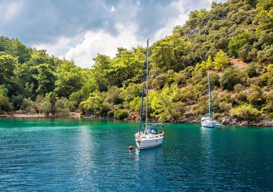 Sarigerme: 12 Islands Boat Trip with Lunch and Transfer - Cleopatra Bath and the remains beneath the water