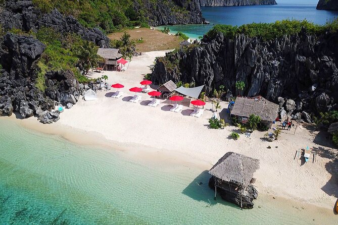 Seacret Luxury Catamaran Yacht Group Island Hopping Tour - Big Lagoon, where cliffs frame the water