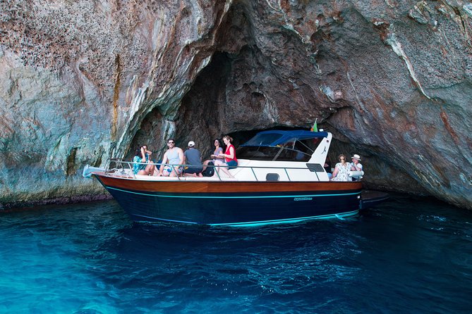 Semi-Private Capri Boat Tour with Snorkeling & Island Visit - Punta Carena Lighthouse from the water