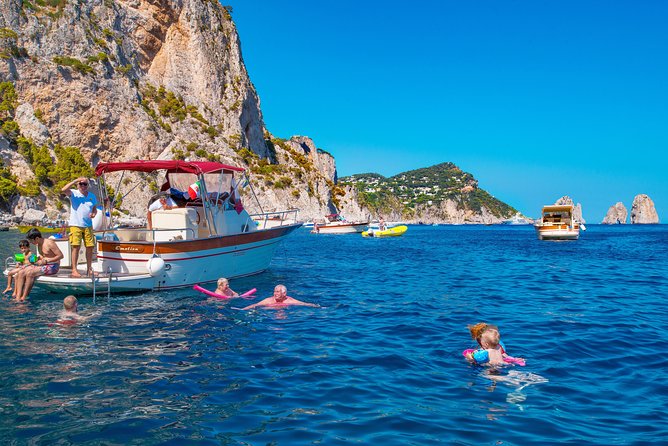 Semi-Private Capri Boat Tour with Snorkeling & Island Visit - The crew, photos, and the day’s tone