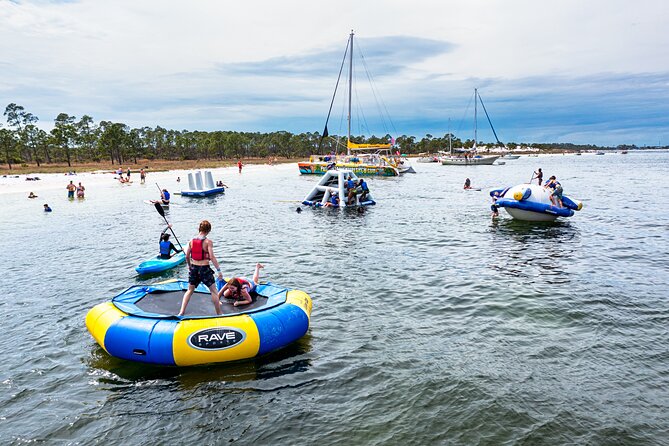 Shell Island Inflatable Adventure Park & Dolphin Sightseeing Tour - Weather, delays, and schedule risks