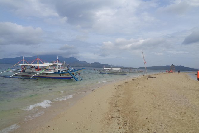 Shore excursion: Puerto Princesa Island Hopping Tour - Guides, food, and the human side of the day