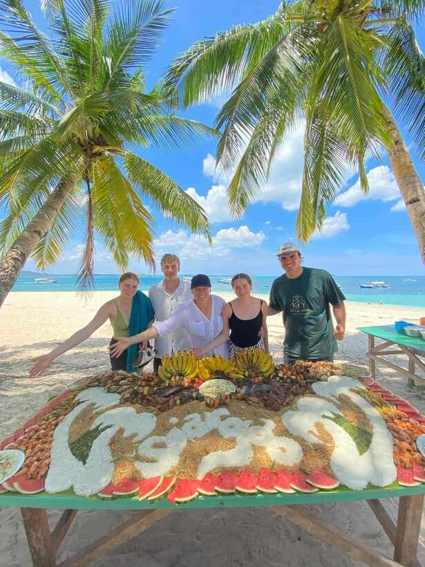 Siargao:Tri Island Hopping Naked Island, Daku, Guyam w/Lunch - Guyam Island, palm trees, and coral rock