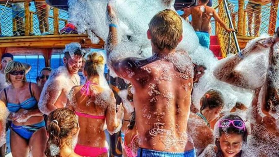 Side: Dolphin Island Boat Tour w/ Lunch & Foam Party - Swimming in warm Turkish Riviera water