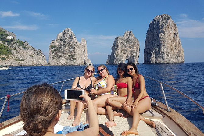 Small Group Boat Day Excursion to Capri Island from Amalfi - Punta Carena Lighthouse from the water