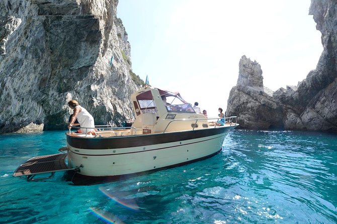 Small Group Capri Island Boat Ride with Swimming and Limoncello - The Faraglioni swim stop