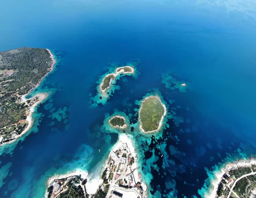 Sunset Sailing to Ksamil Islands with Fruits and Drinks - Sailing past Ksamil and the three islands