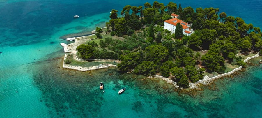 Zadar: 3 Islands Luxury Boat Tour with Aperol Spritz - Leaving Zadar with Old Town views