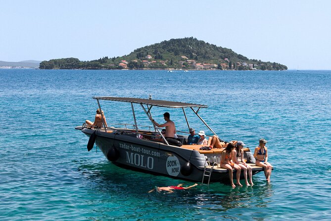 Zadar: 3 Islands Luxury Boat Tour with Aperol Spritz & Snorkeling - What the crew adds to the day